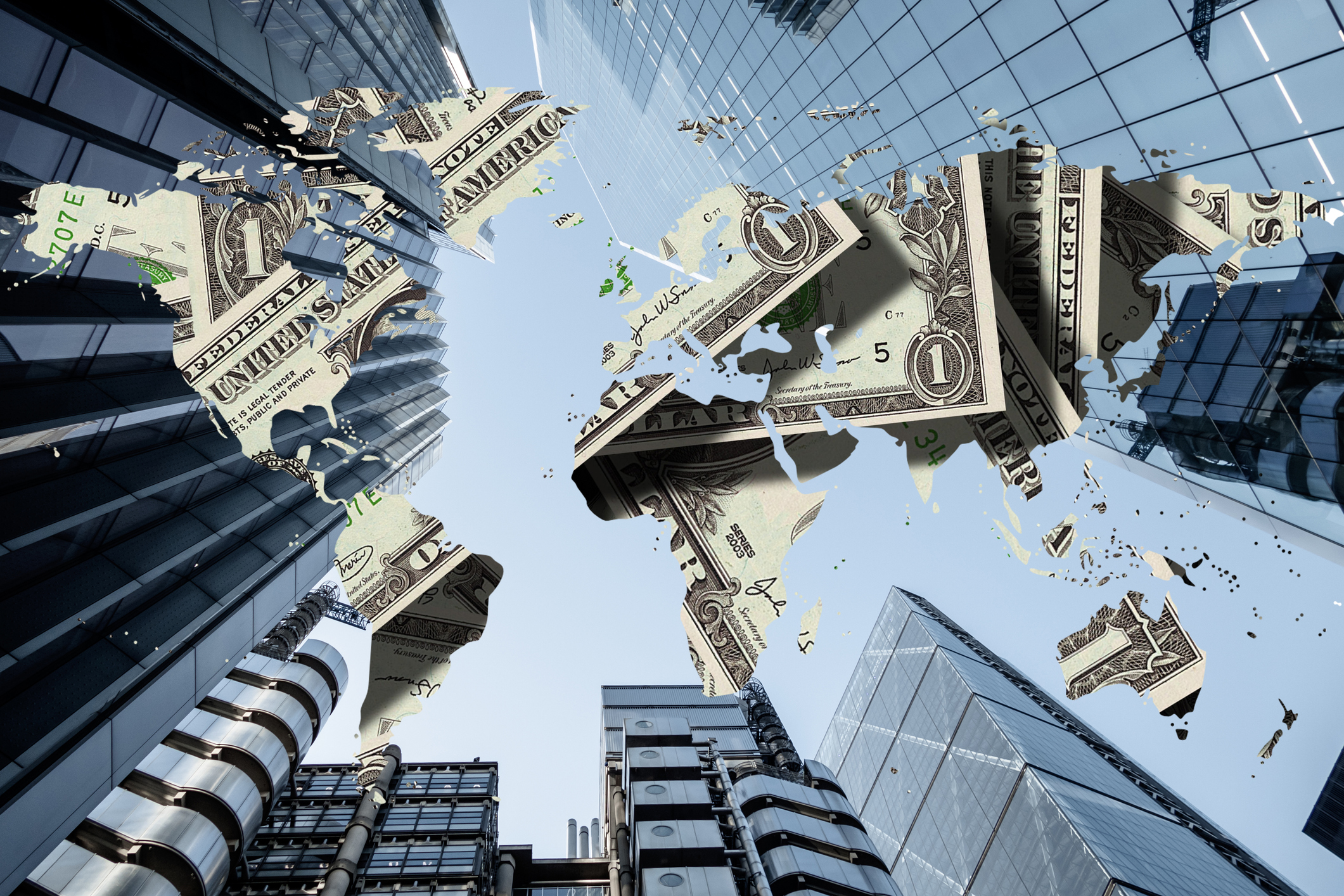 Private credit concept: looking up at corporate skyscrapers overlaid with a world map covered in US dollars 