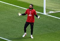 LIVERPOOL, ENGLAND - MAY 24: Alisson Becker of Liverpool reacts as the team warms up prior to the Premier League match between Liverpool and Brentford at Anfield on May 24, 2026 in Liverpool, England. (Photo by Liverpool FC/Liverpool FC via Getty Images)