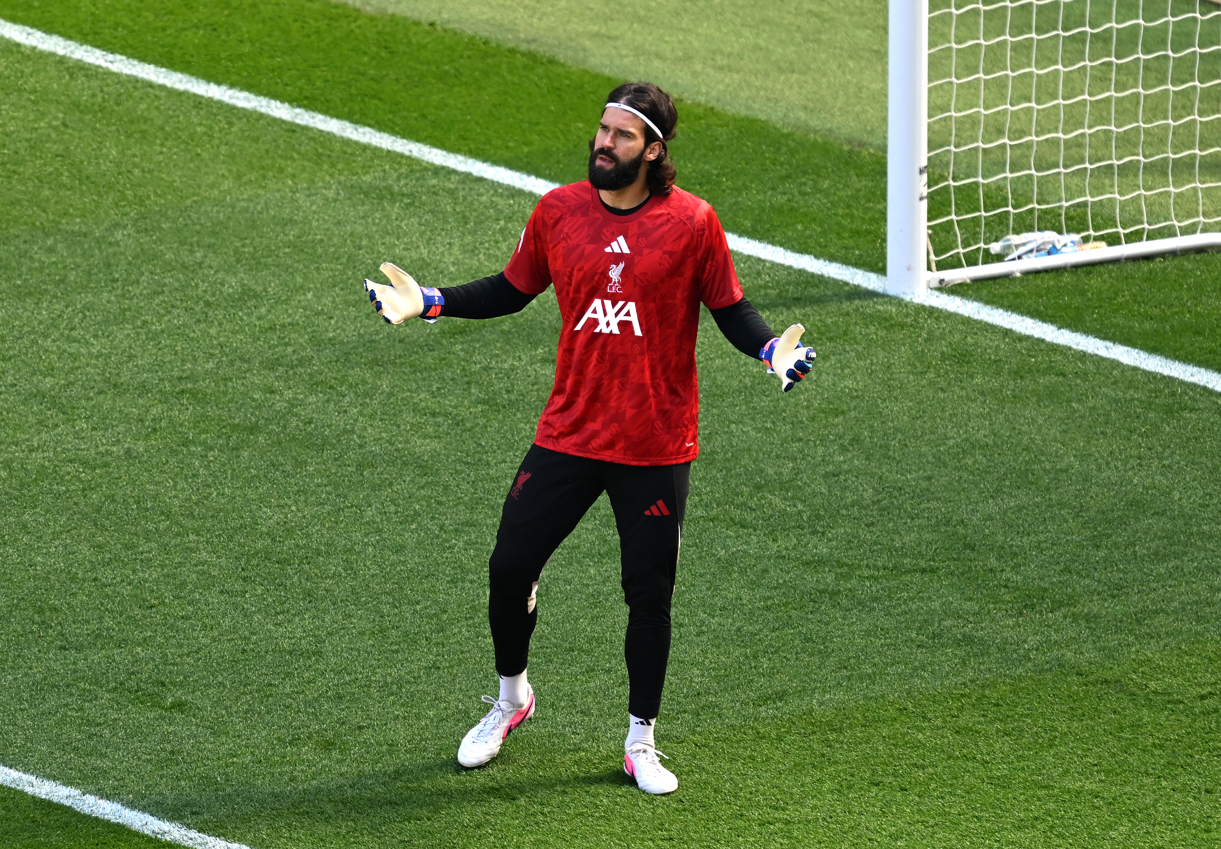 LIVERPOOL, ENGLAND - MAY 24: Alisson Becker of Liverpool reacts as the team warms up prior to the Premier League match between Liverpool and Brentford at Anfield on May 24, 2026 in Liverpool, England. (Photo by Liverpool FC/Liverpool FC via Getty Images)