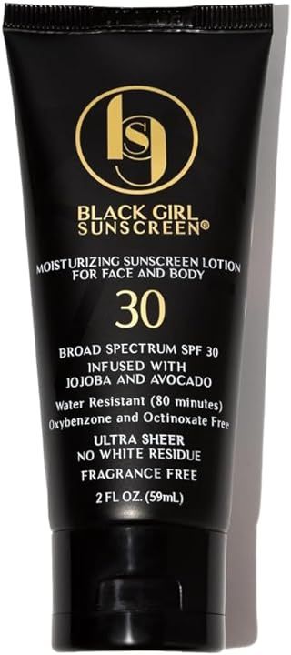 A bottle of Black Girl Sunscreen SPF 30 with gold lettering
