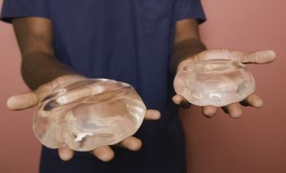 Jumping starting some early body-conscious behavior, a plastic surgeon parent brought in breast implants to a Virginia elementary school career day to the dismay of parents.