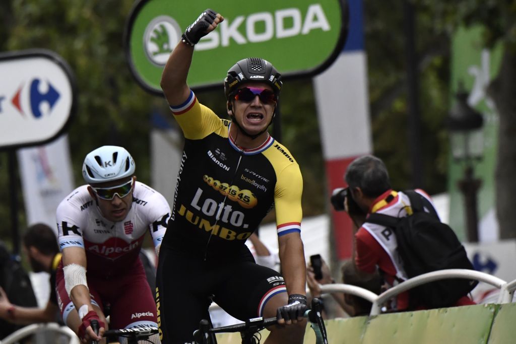 Dylan Groenewegen celebrates a Champs-Elysees victory.