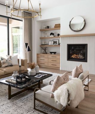 Cozy, neutral living room with curated additions for a cozier ambiance and more inviting layout