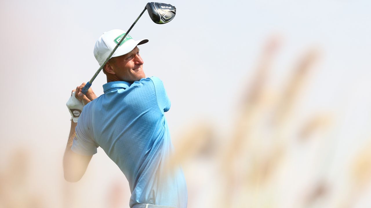 Adrian Meronk of Cleeks GC plays a tee shot on the 14th hole during day two of the LIV Golf Invitational - Jeddah at Royal Greens Golf &amp; Country Club on March 02, 2024 in King Abdullah Economic City, Saudi Arabia.