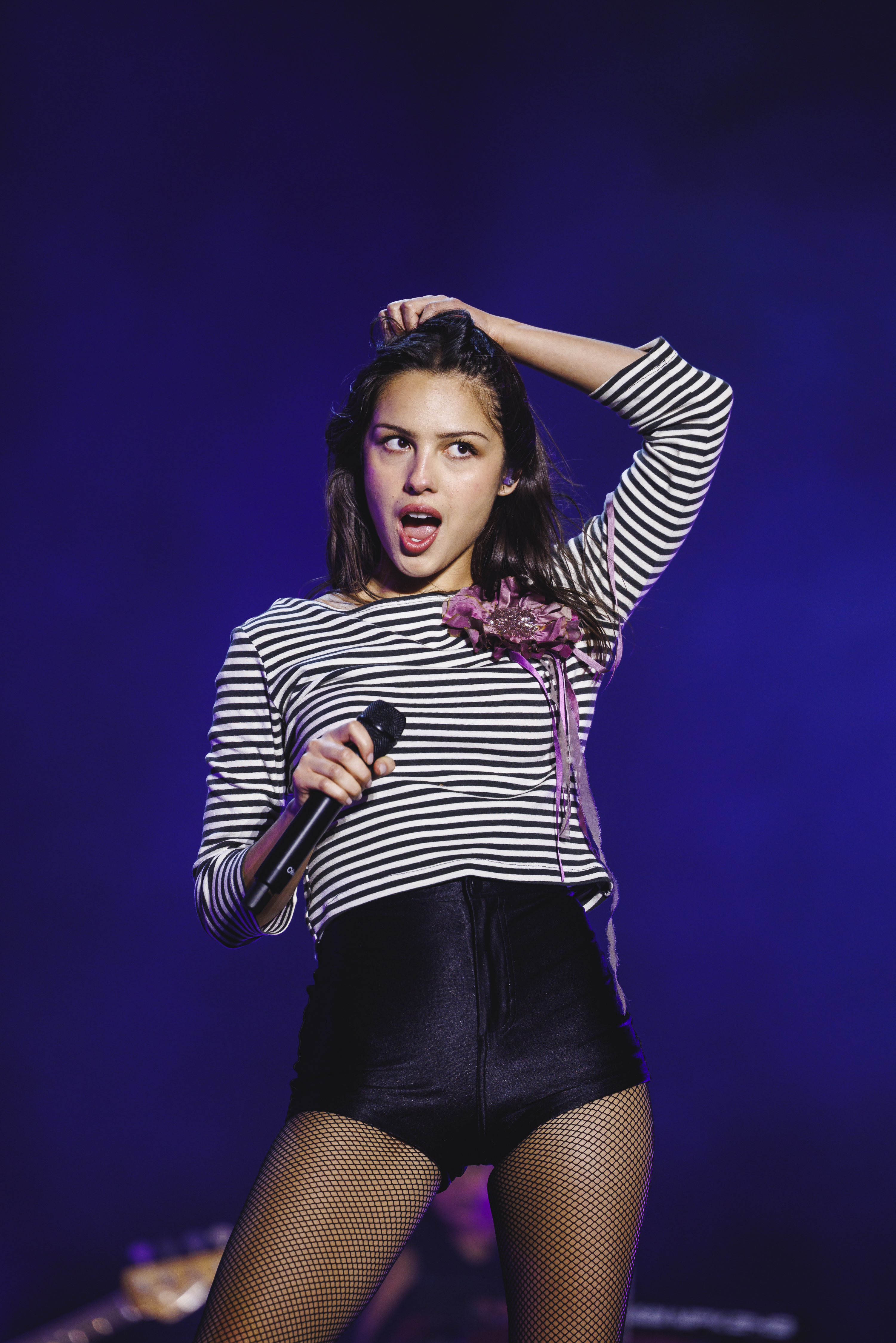 Olivia Rodrigo performs during Primavera Sound 2026 at Parc Del Forum in Barcelona, Spain on June 6, 2026 wearing black hot pants, a striped breton top, and knee-high Dr Martens boots