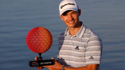 Nicolai Hojgaard with the trophy after winning the 2022 Ras Al Khaimah Championship 