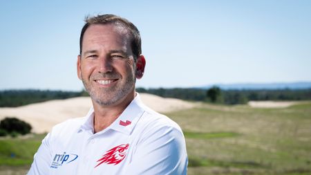 Sergio Garcia smiles at the camera during a 2024 photoshoot with Golf Monthly