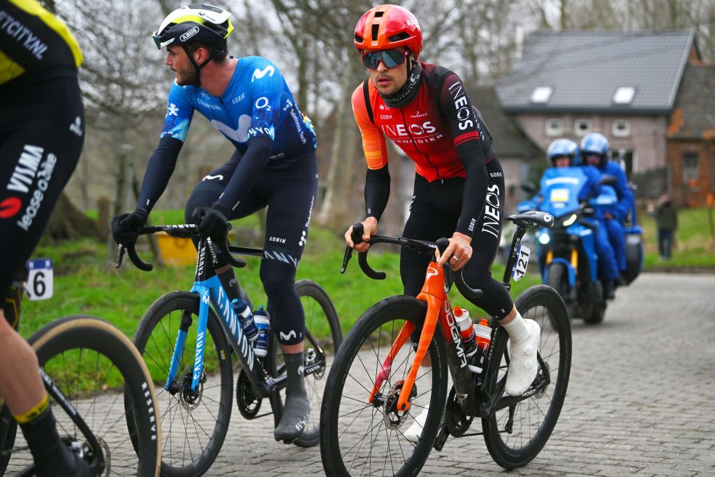 NINOVE BELGIUM FEBRUARY 24 LR Manlio Moro of Italy and Movistar Team and Thomas Pidcock of Great Britain and Team INEOS Grenadiers compete during the 79th Omloop Het Nieuwsblad 2024 Mens Elite a 2022km one day race from Ghent to Ninove UCIWT on February 24 2024 in Ninove Belgium Photo by Luc ClaessenGetty Images