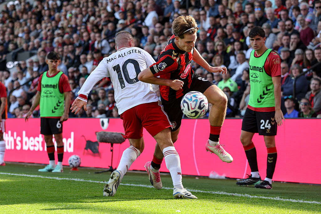 Alex Scott in action against Liverpool