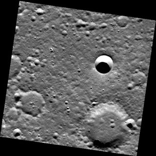 The craters in this scene, taken May 22, 2011, span a variety of degradation states. The sharp-looking crater near the center of the image has not undergone significant infilling or degradation, unlike the larger craters to the south. Its appearance indic