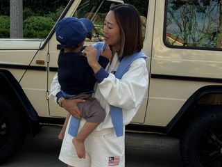 @aimeesong holding a baby.