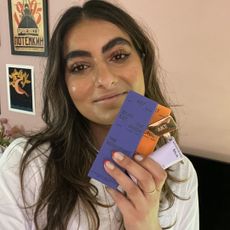 Humeara holding the AKT Deodorant Balm