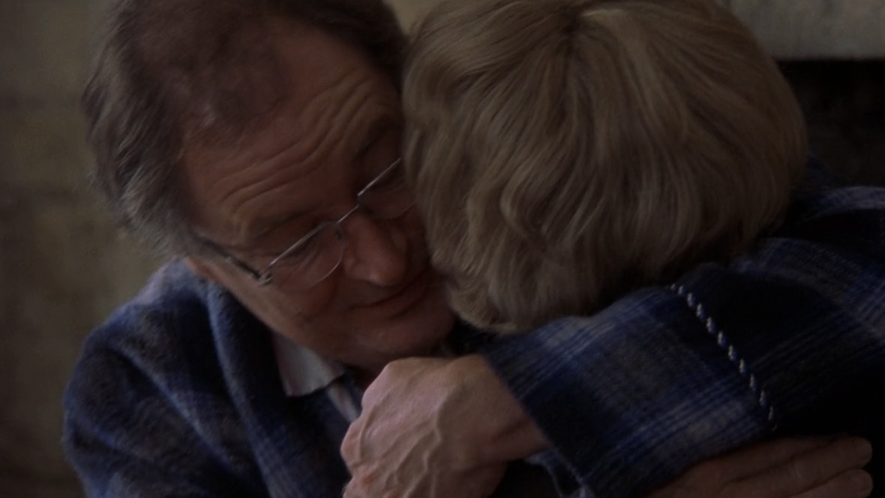 Bridget's father hugging his wife in Bridget Jones's Diary