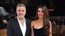 Amal Clooney's black velvet co-ord was the perfect Christmas party outfit inspiration as she stepped out in London with her husband