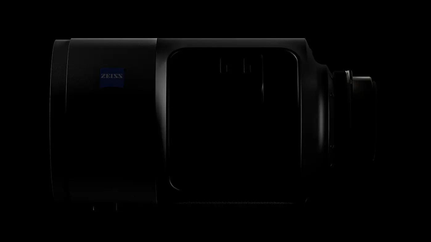 A shadowy mysterious Zeiss lens on a dark background