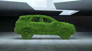 picture of a green SUV EV made of grass
