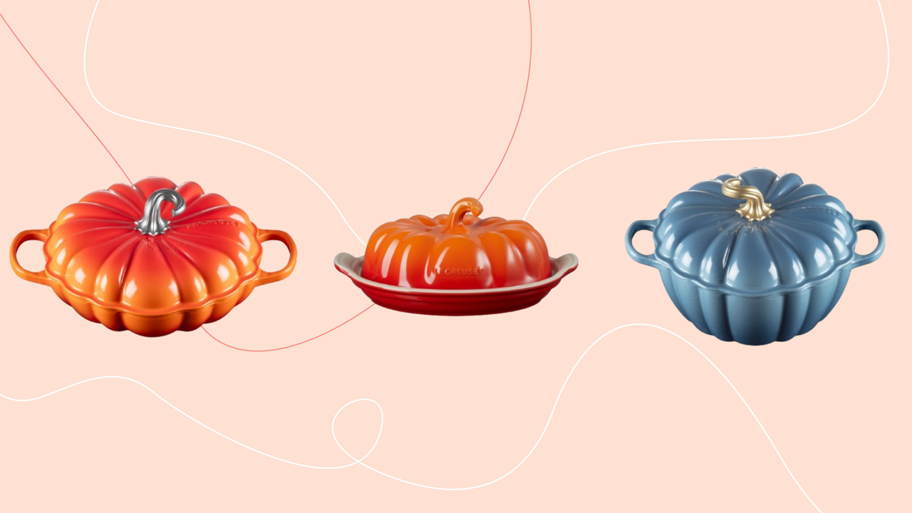 Three Le Creuset dishes on pink backgound. From left to right is orange pumpkin cassorole, orange pumpkin butter dish and blue pumpkin casserole