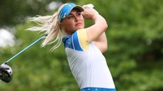 Charley Hull takes a tee shot during the Friday afternoon four ball at the Solheim Cup