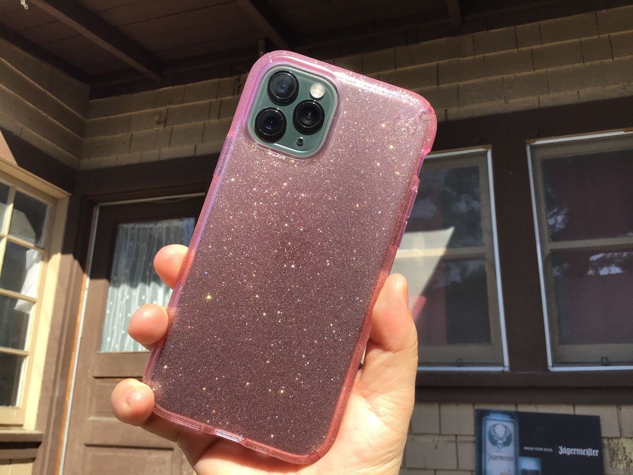 Speck Presidio Clear + Glitter held in sunlight