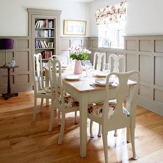 dining room with wooden flooring and flower