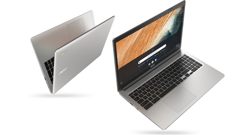 A pair of laptops on a white background