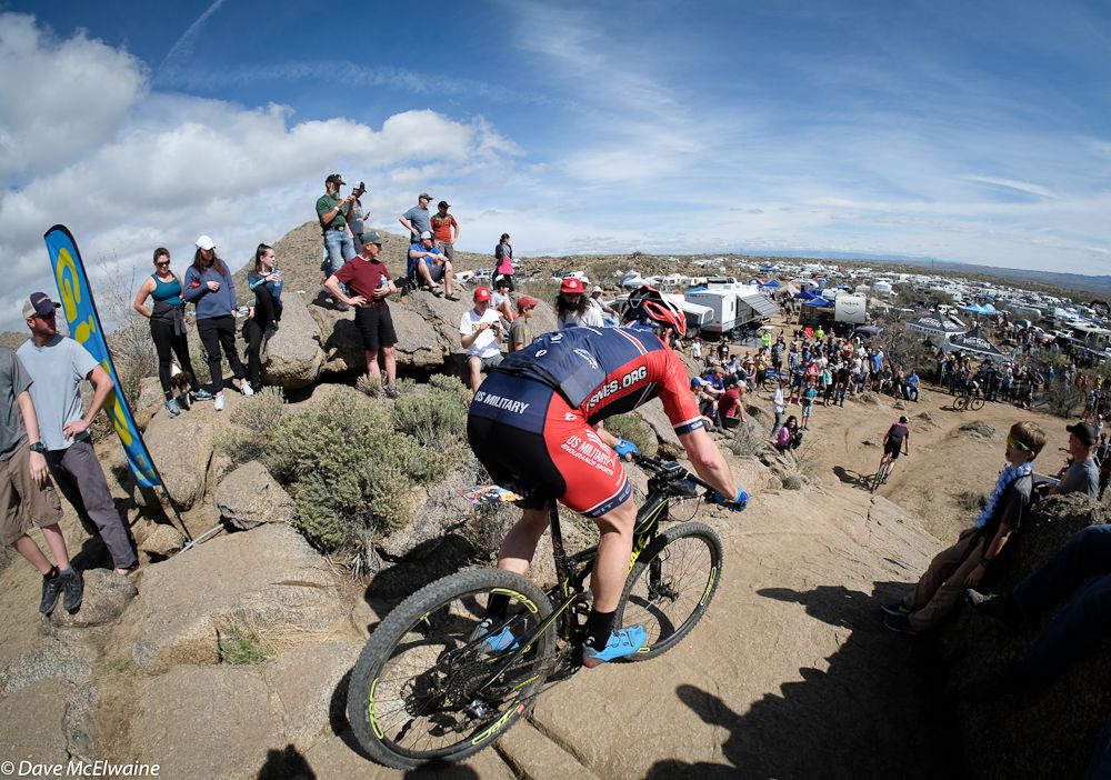 A US Military rider approaches a steep section of the course