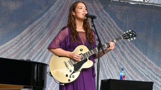LOS ANGELES, CALIFORNIA - AUGUST 24: Laufey performs onstage with FIJI Water at A Very Laufey Day 2025 at Los Angeles Grand Park on August 24, 2025 in Los Angeles, California. (Photo by Michael Kovac/Getty Images for FIJI Water)