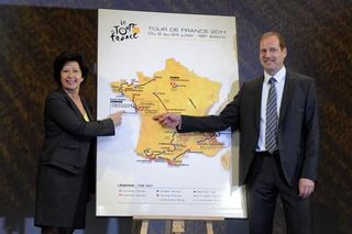 Veronique Besse and Tour de France director Christian Prudhomme point to the Vendee start of the 2011 Grand Depart