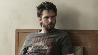 Pepper in T-shirt sitting in institution bed in The Terror: Devil in Silver