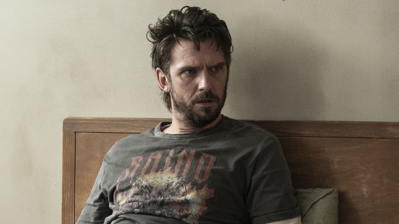 Pepper in T-shirt sitting in institution bed in The Terror: Devil in Silver