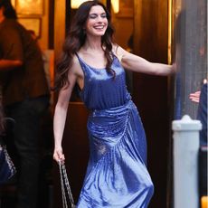 Anne Hathaway wearing blue dress