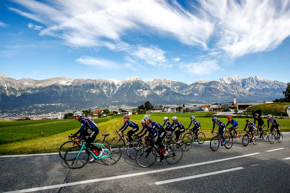 Blue skies and beautiful mountains frame Team USA on a training ride