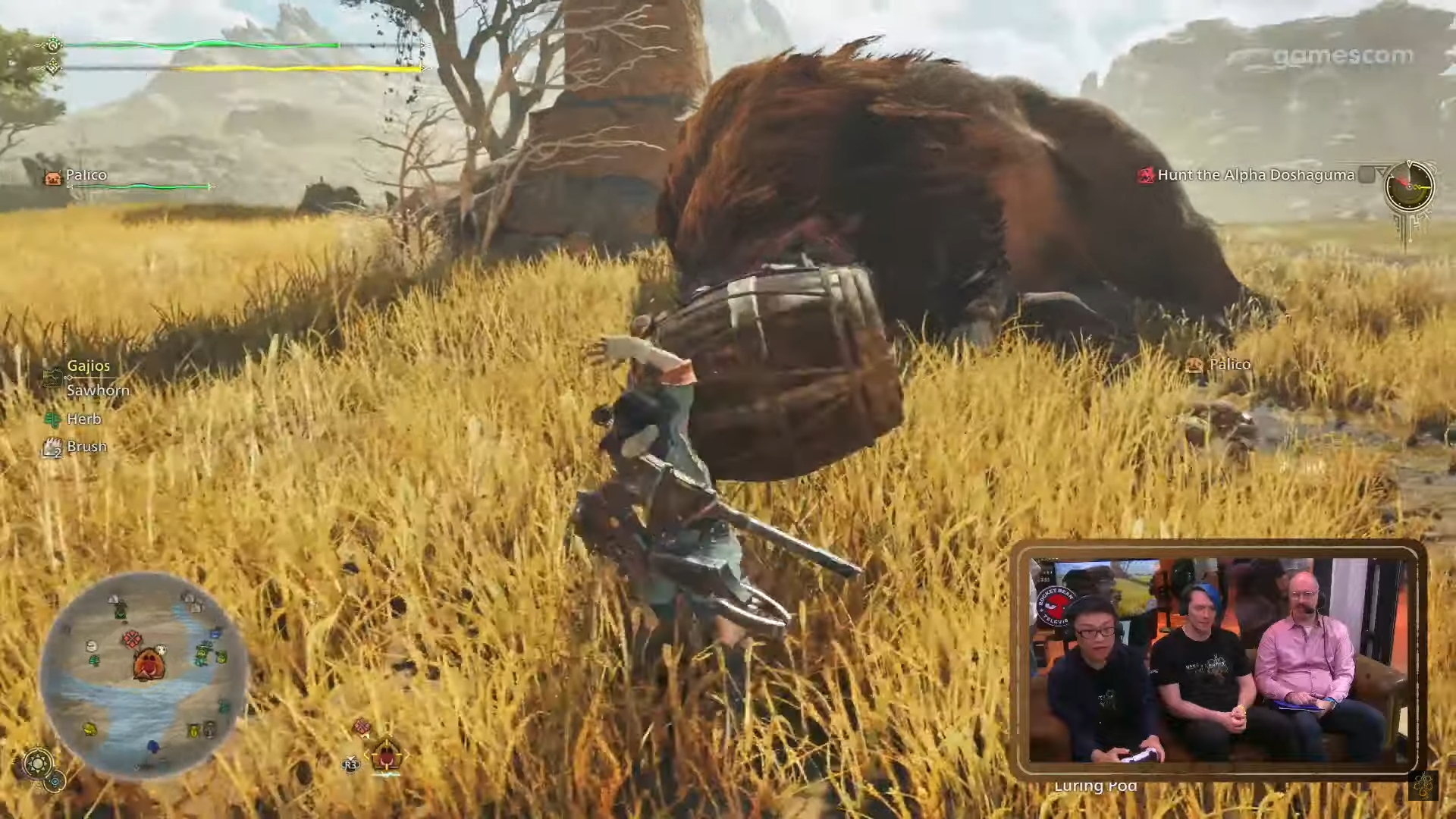 A hunter hurls a barrel bomb during a Monster Hunter Wilds stream at Gamescom.