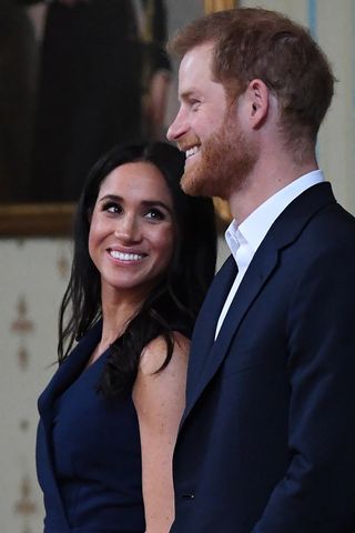 Meghan Markle lovingly smiles at Prince Harry