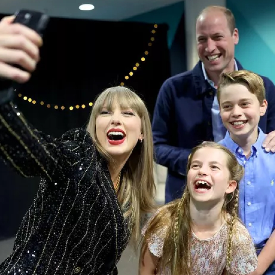 Taylor Swift taking a selfie with Prince William, Princess Charlotte and Prince George 