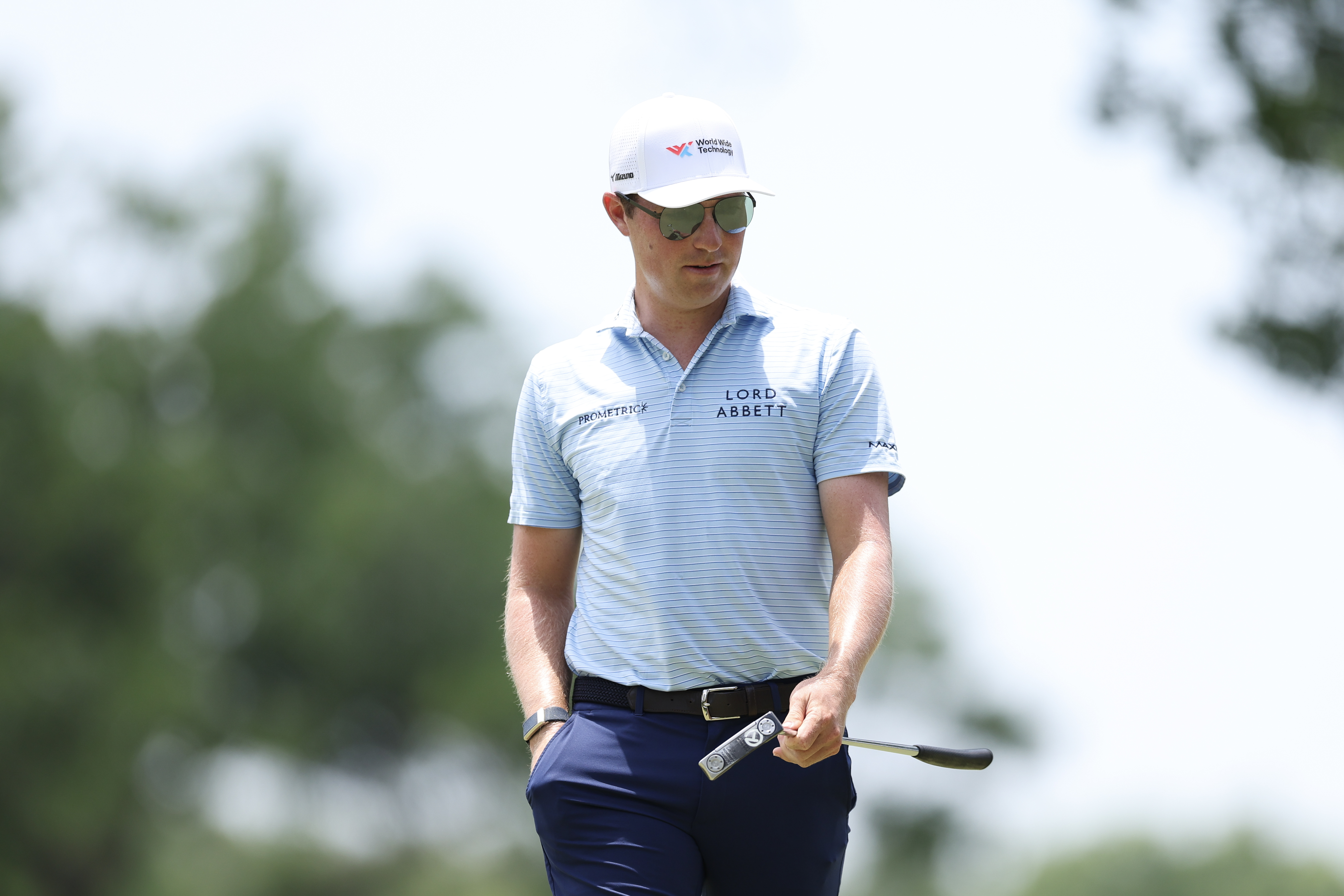 Ben Griffin walks off the green