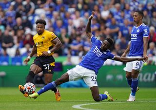 Wolverhampton Wanderers’ Adama Traore (left) and Leicester City’s Wilfred Ndidi battle for the ball during the Premier League match at the King Power Stadium, Leicester. Picture date: Saturday August 14, 2021
