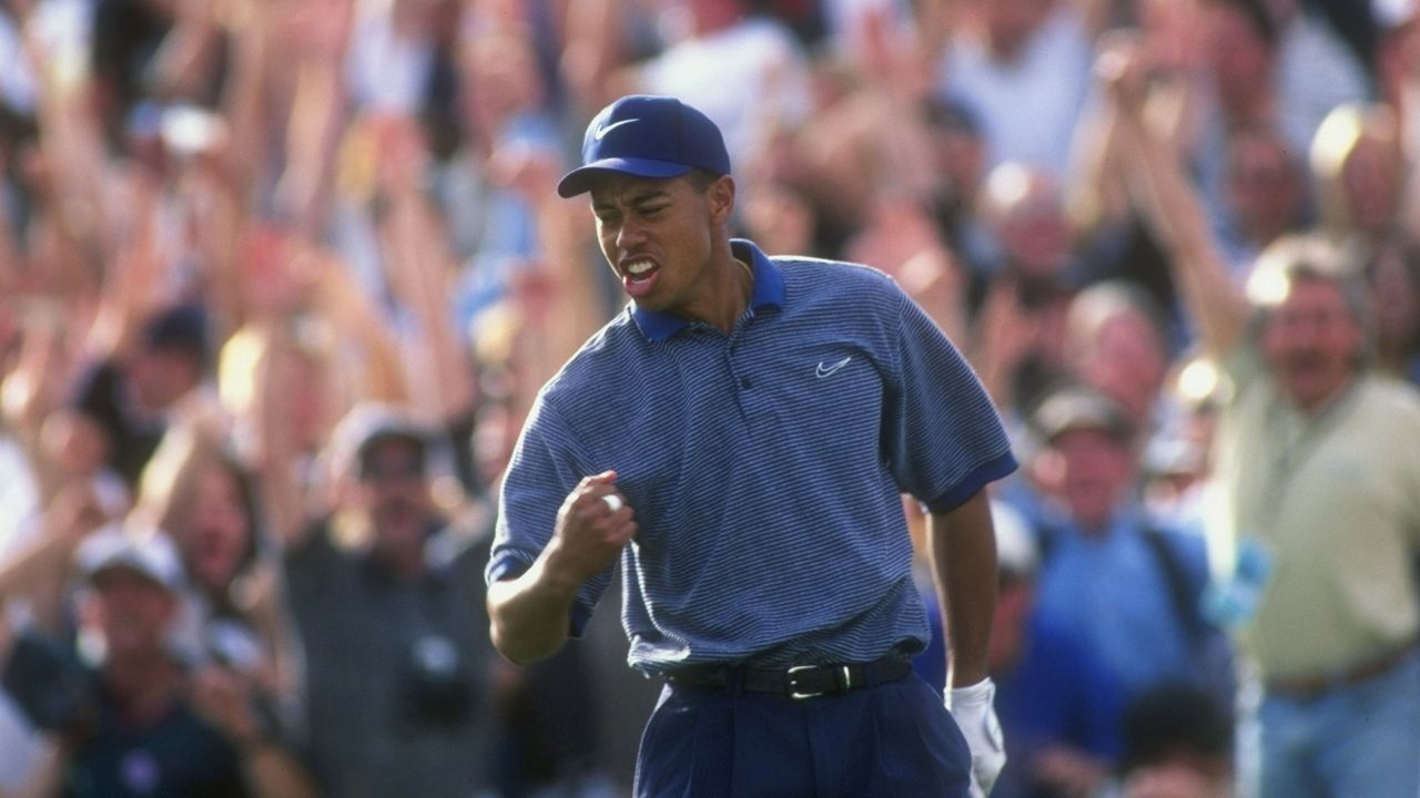 Tiger Woods celebrates after his hole-in-one at the 1997 Phoenix Open