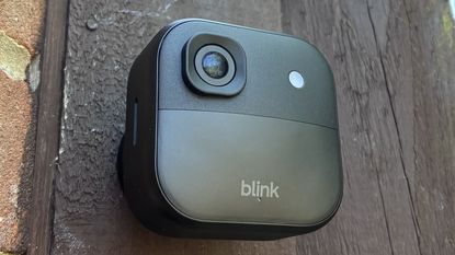 Blink Outdoor 2K+ security camera mounted on wall