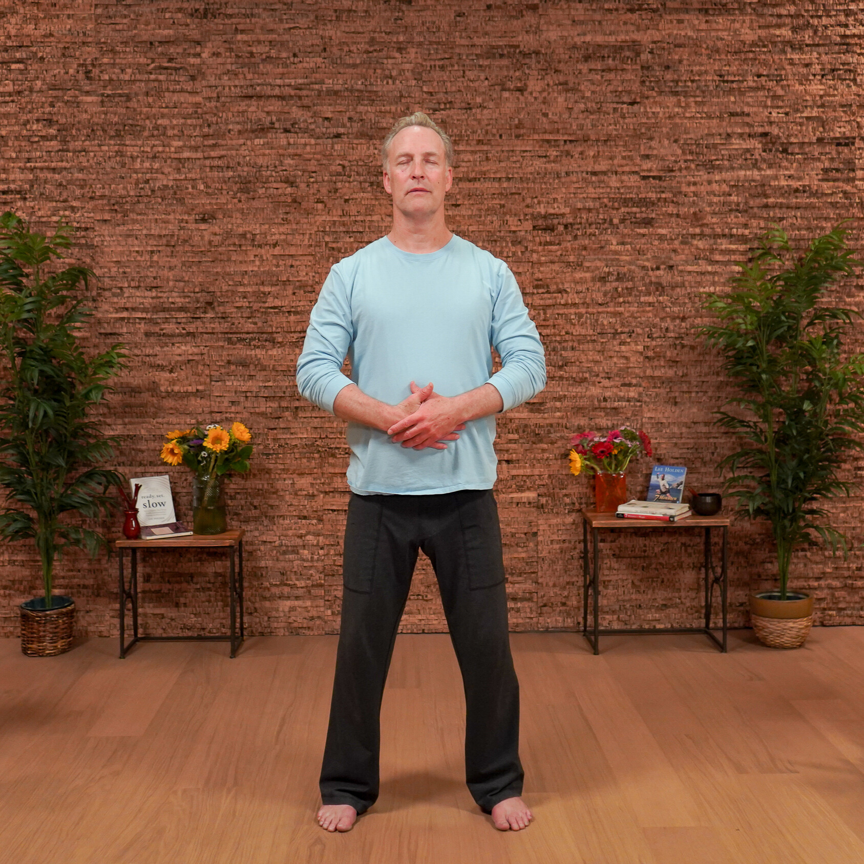 Man demonstrating Qigong movements