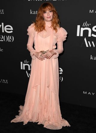 Natasha Lyonne in a pink dress