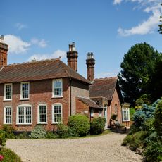 Exterior of a Georgian country house with gravel drive