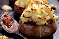 Cottage pies in baked potatoes