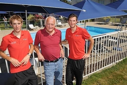 Andy and Frank Schleck flank their father Johnny