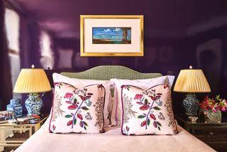 bedroom with purple gloss walls