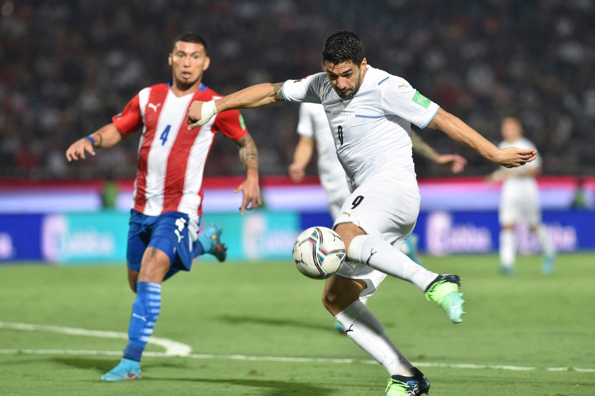 Uruguay&#039;s Luis Suarez scoring a goal against Paraguay in the World Cup 2022 qualifiers