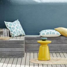 wooden bench seating with a painted wall in Little Greene Air Force Blue