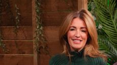 A HEADSHOT OF CAT DEELEY