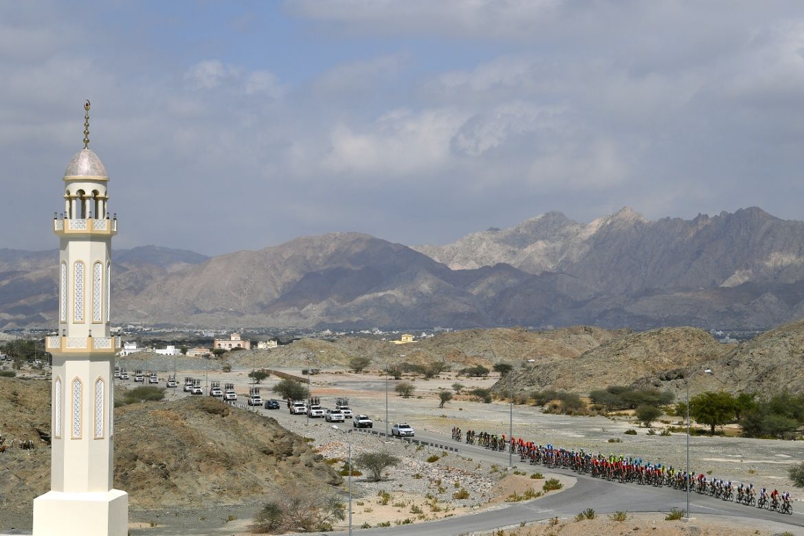 The caravan lines out behind the peloton