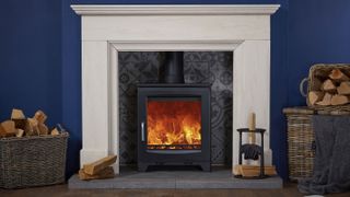fireplace with log burning stove